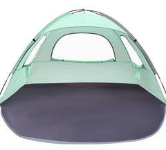 WhiteFang Beach Tent mint green provides UV protection for a shaded family day.