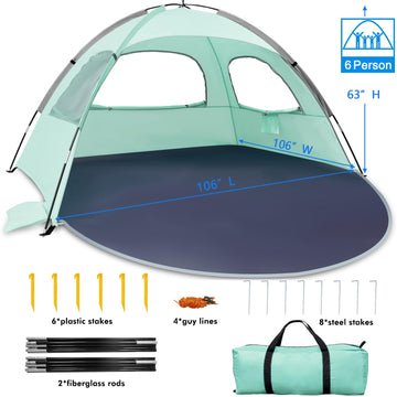 WhiteFang Beach Tent setup on the sand for family shade and comfort.
