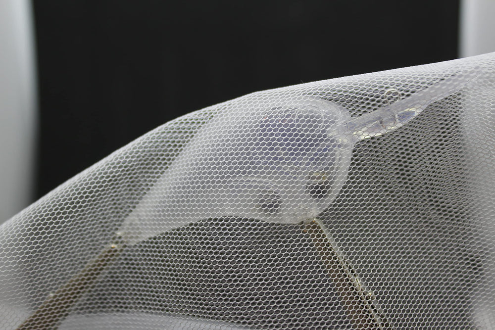 Whitmore Farm mesh airbrush netting used in crafts and masking projects