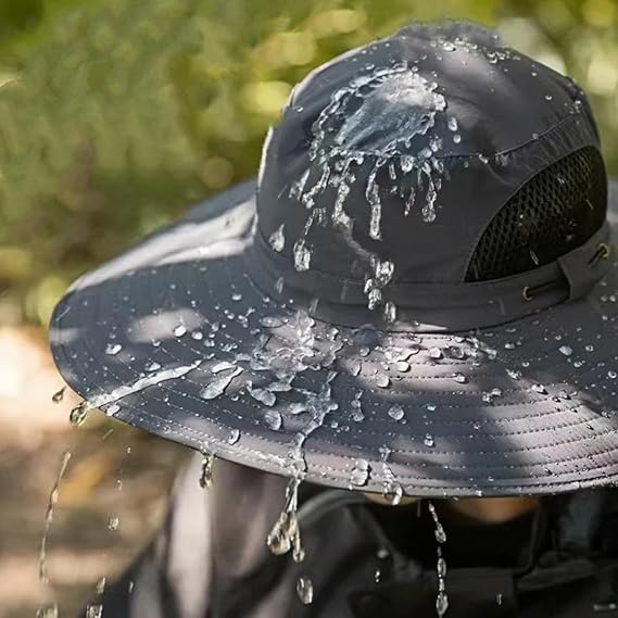 Model wearing black wide brim solar fan hat outdoors