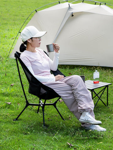 WildCall anti-sink-feet folding chair provides stable seating on sand and soft ground.