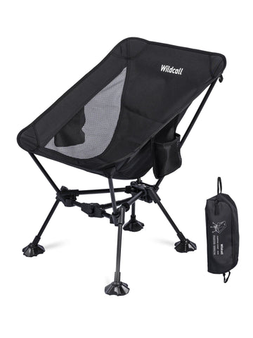 WildCall lightweight folding camping chair on the beach; portable, quick setup for on-the-go seating.