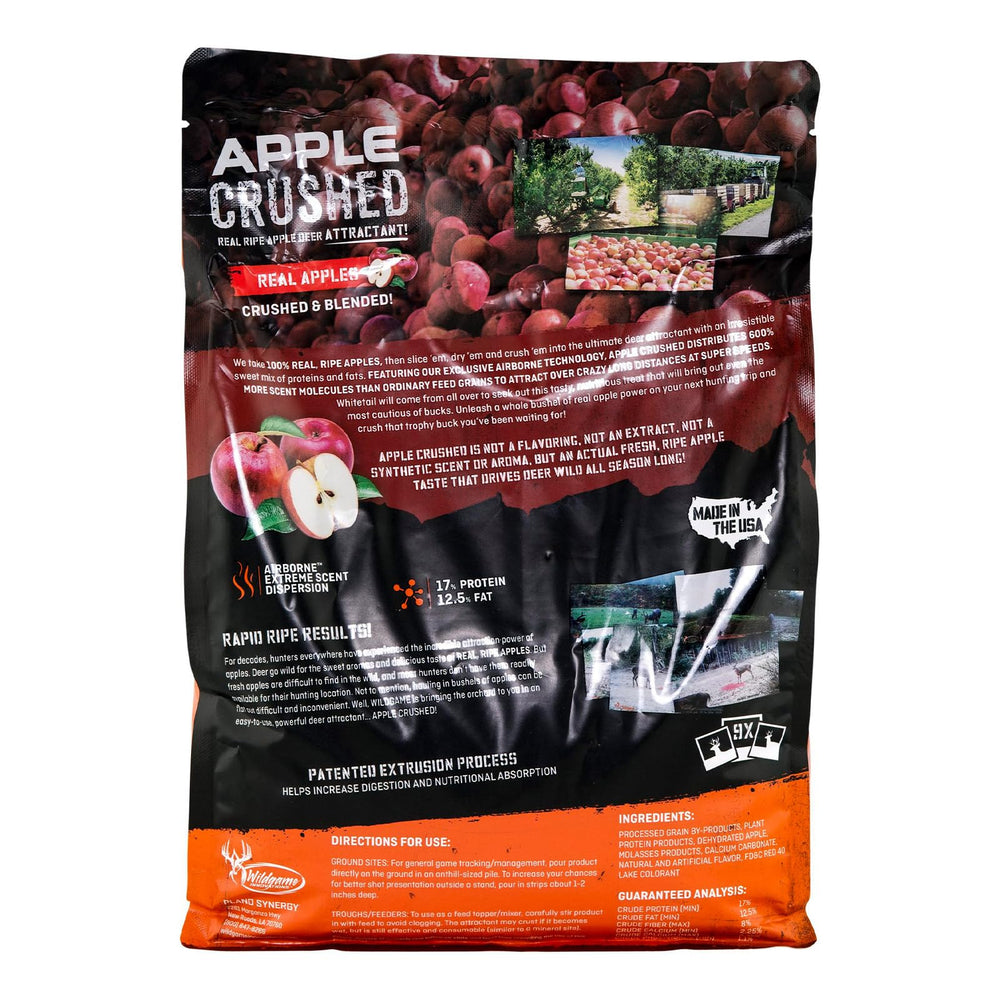 Wildgame Innovations Apple Crushed pour-ready attractant being poured into a feeder area