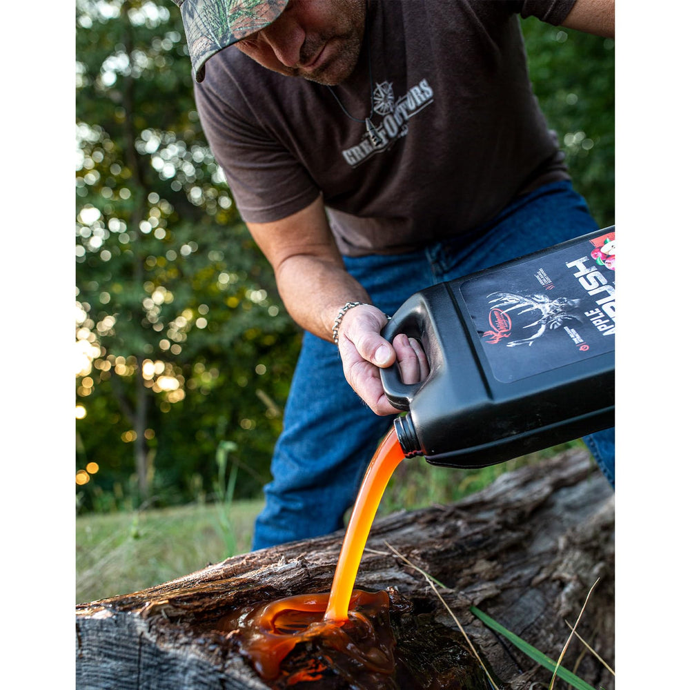Wildgame Innovations Apple Crushed attractant poured over logs attracts deer nearby.