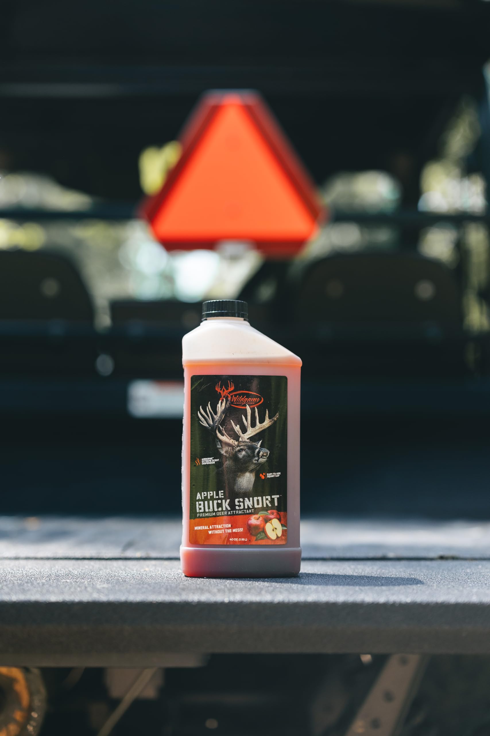 Wildgame Innovations Buck Snort Apple cap enables quick, spill-free use.