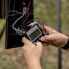 Wildgame Innovations Evolution Feeder installation mount demonstrates sturdy setup for rugged field use