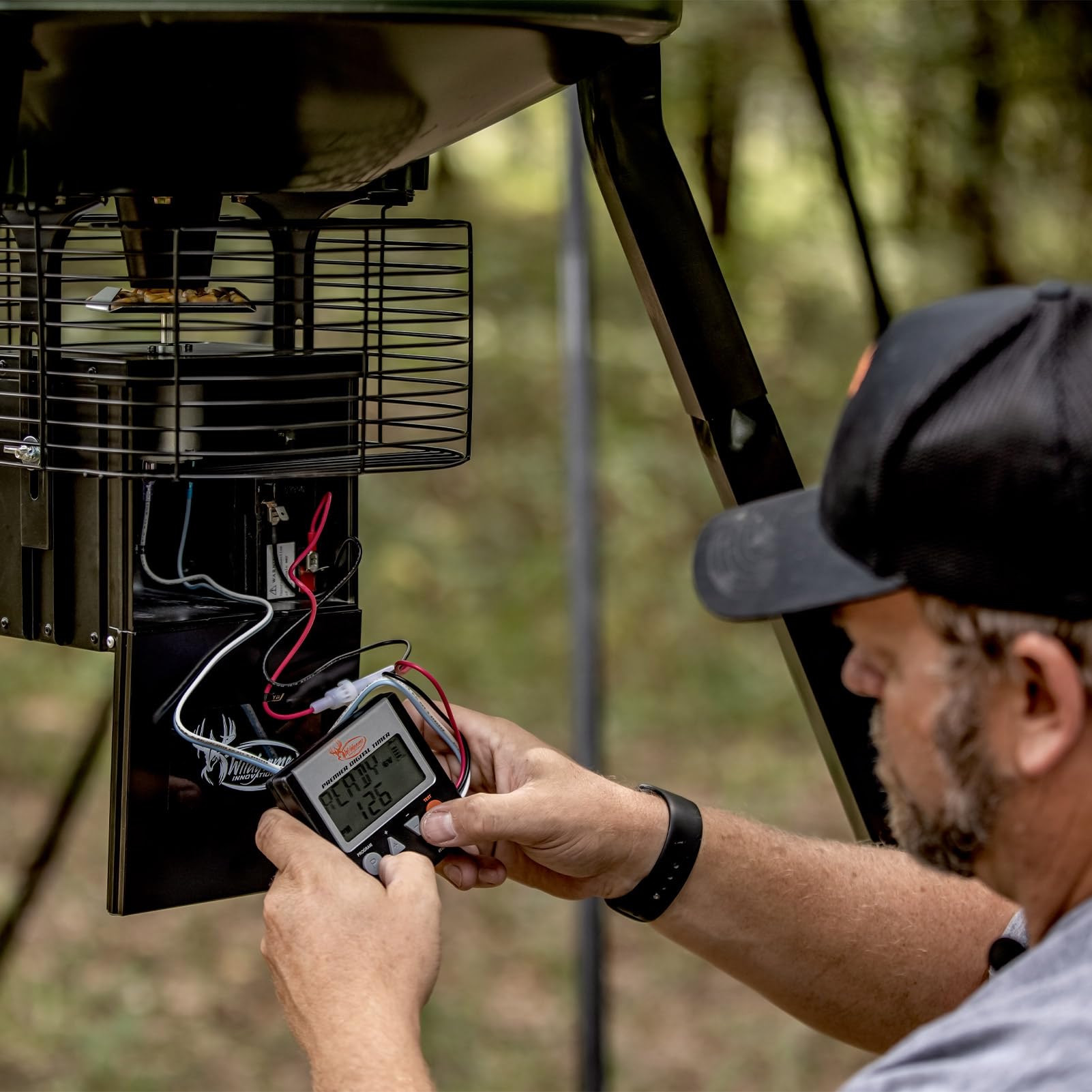 Wildgame Innovations Trophy Hunter timer back view showing battery indicator for field readiness.