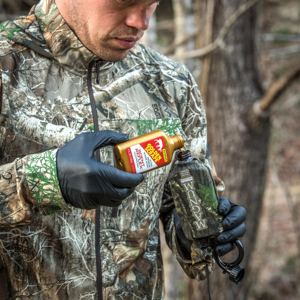 Close-up of Golden Scrape scent bottles included in the kit.