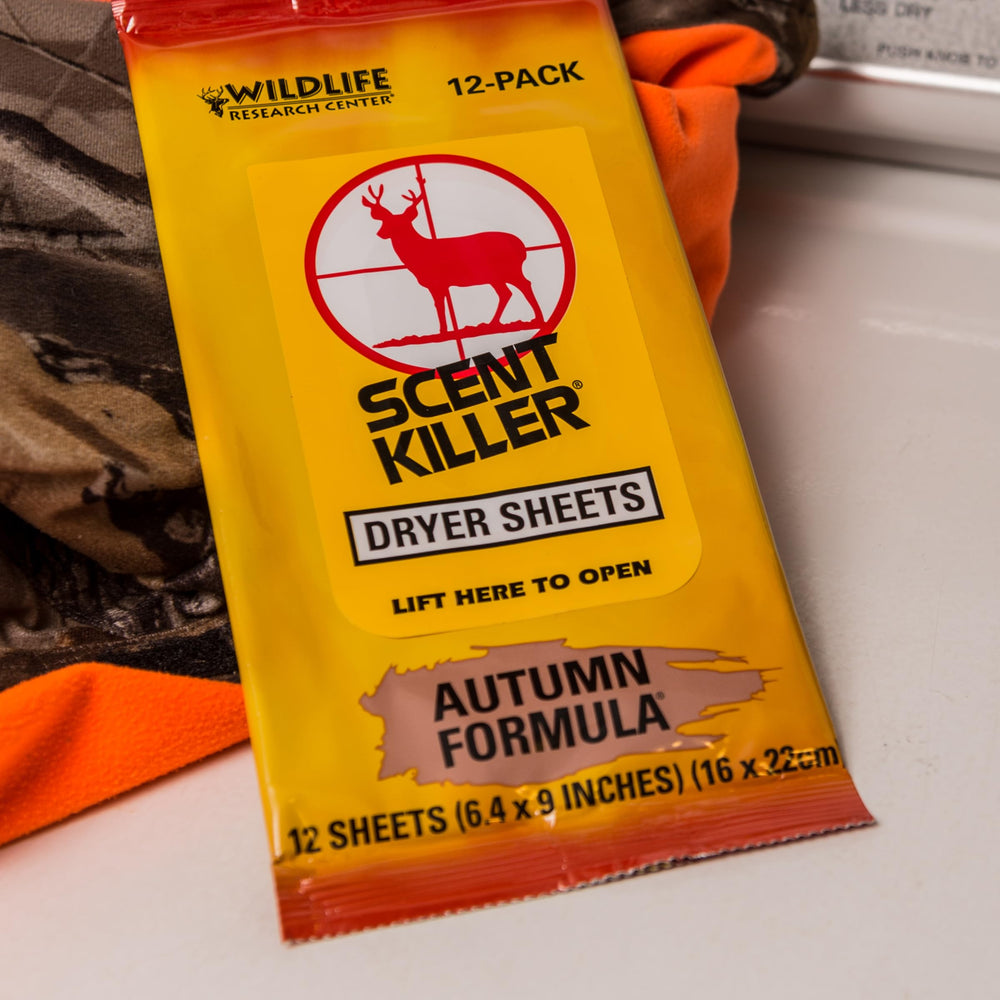 Wildlife Research Center 580 Scent Killer Autumn Dryer Sheets yellow sheet close-up highlights softening action.