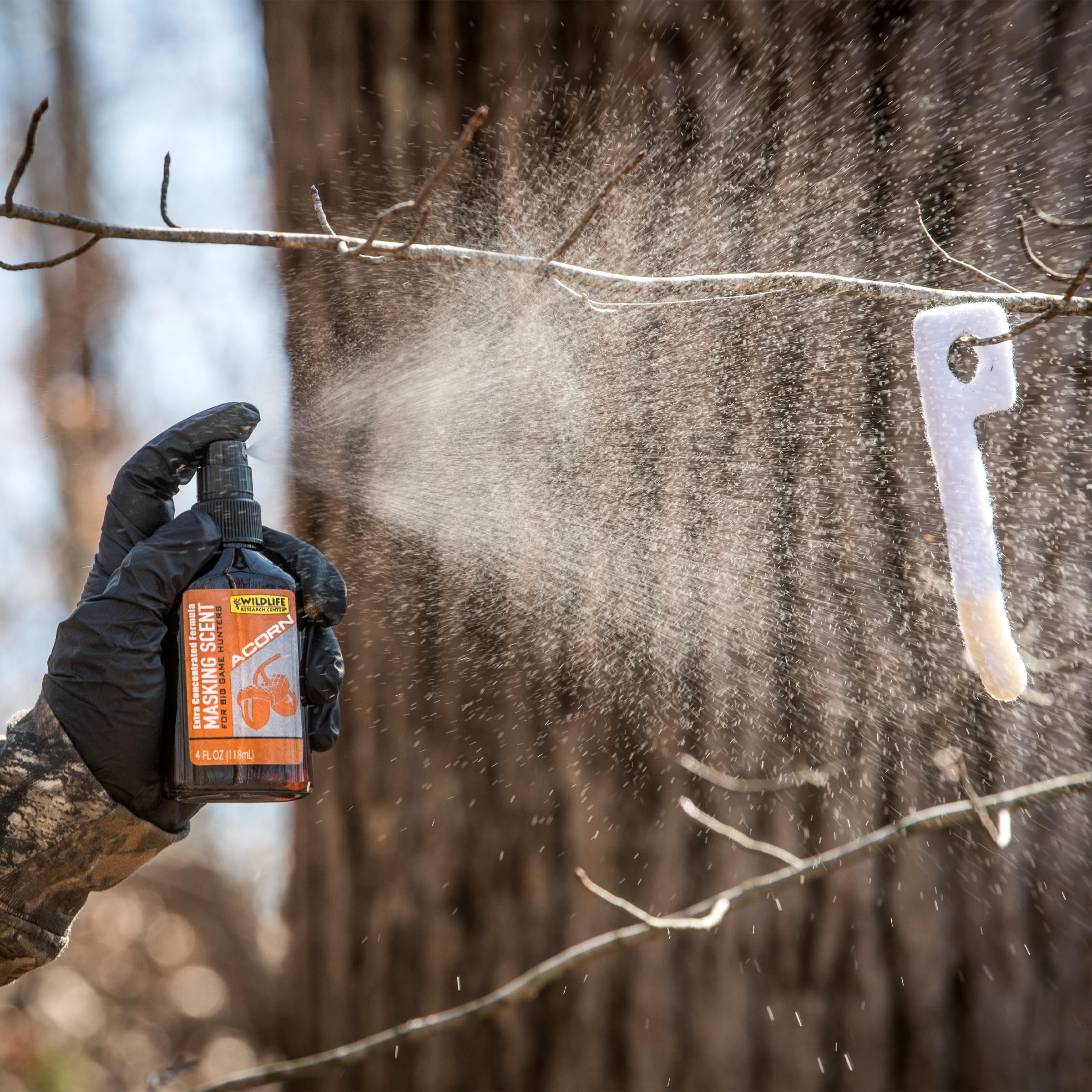 Wildlife Research Center Acorn Masking Scent on scent wick during field use