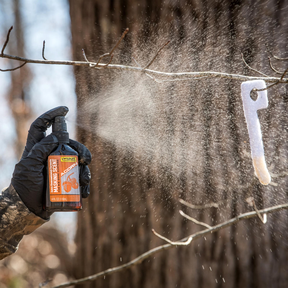 Wildlife Research Center Acorn Masking Scent on scent wick during field use