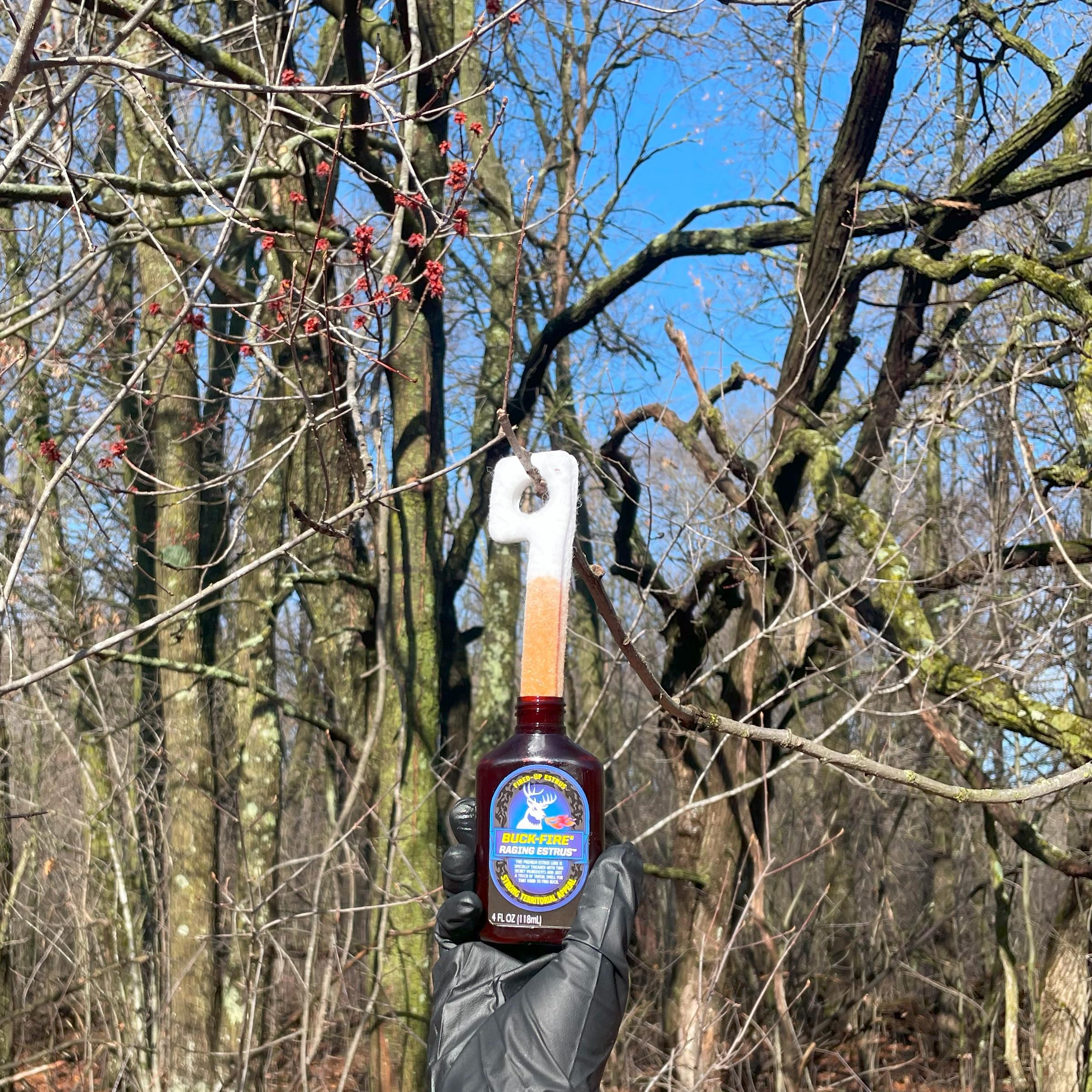 Close-up Buck-Fire bottle shows micro brew craft scent lineage.