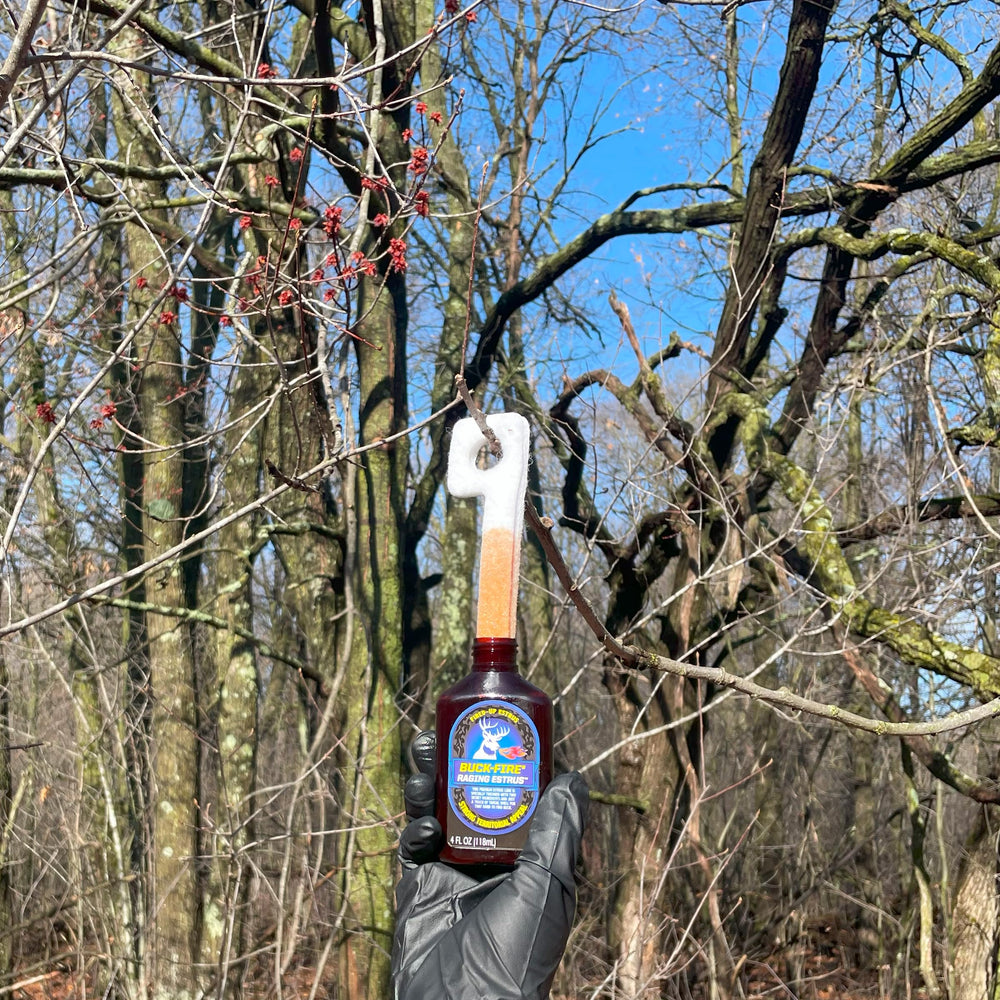 Close-up Buck-Fire bottle shows micro brew craft scent lineage.