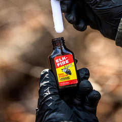 Wildlife Research Center Elk Fire label close-up confirming branding for reliable field use.