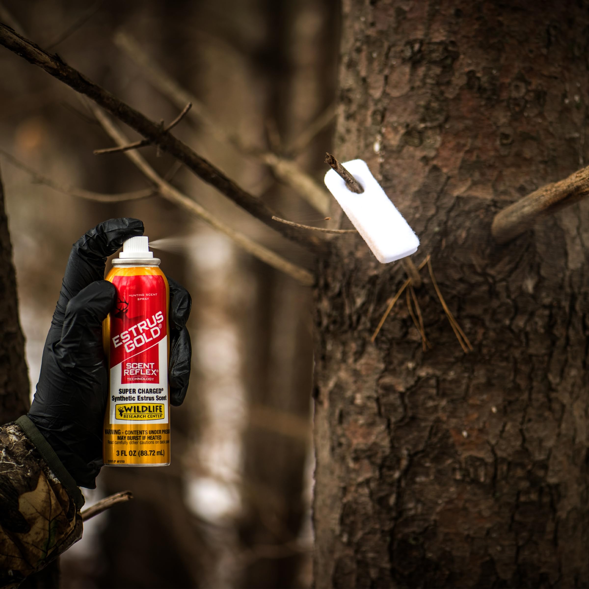Wildlife Research Center Estrus Gold Spray packaging remains field-ready and convenient.
