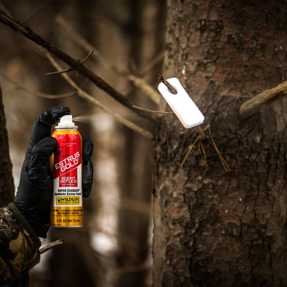 Wildlife Research Center Estrus Gold Spray packaging remains field-ready and convenient.