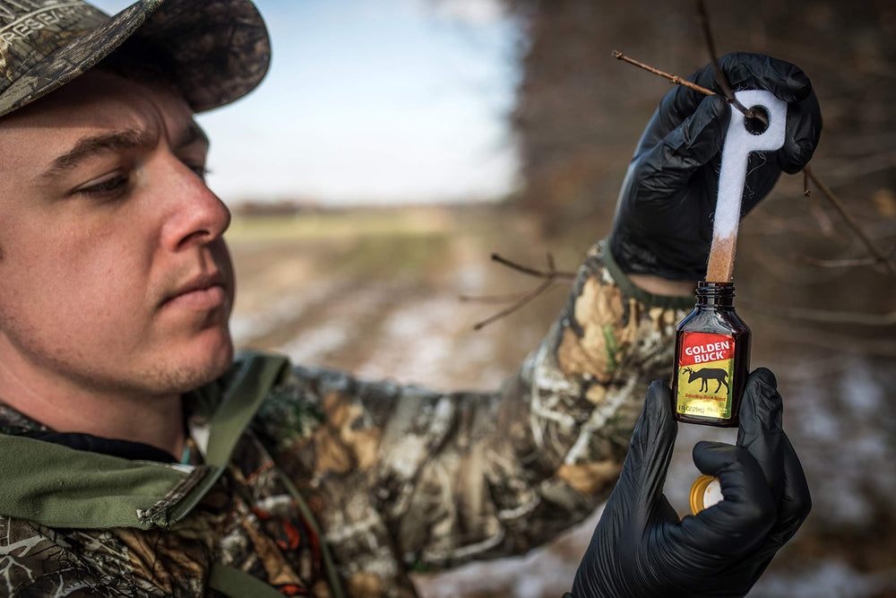 Golden Buck Scent bottle on treestand prompts territorial signals from bucks.