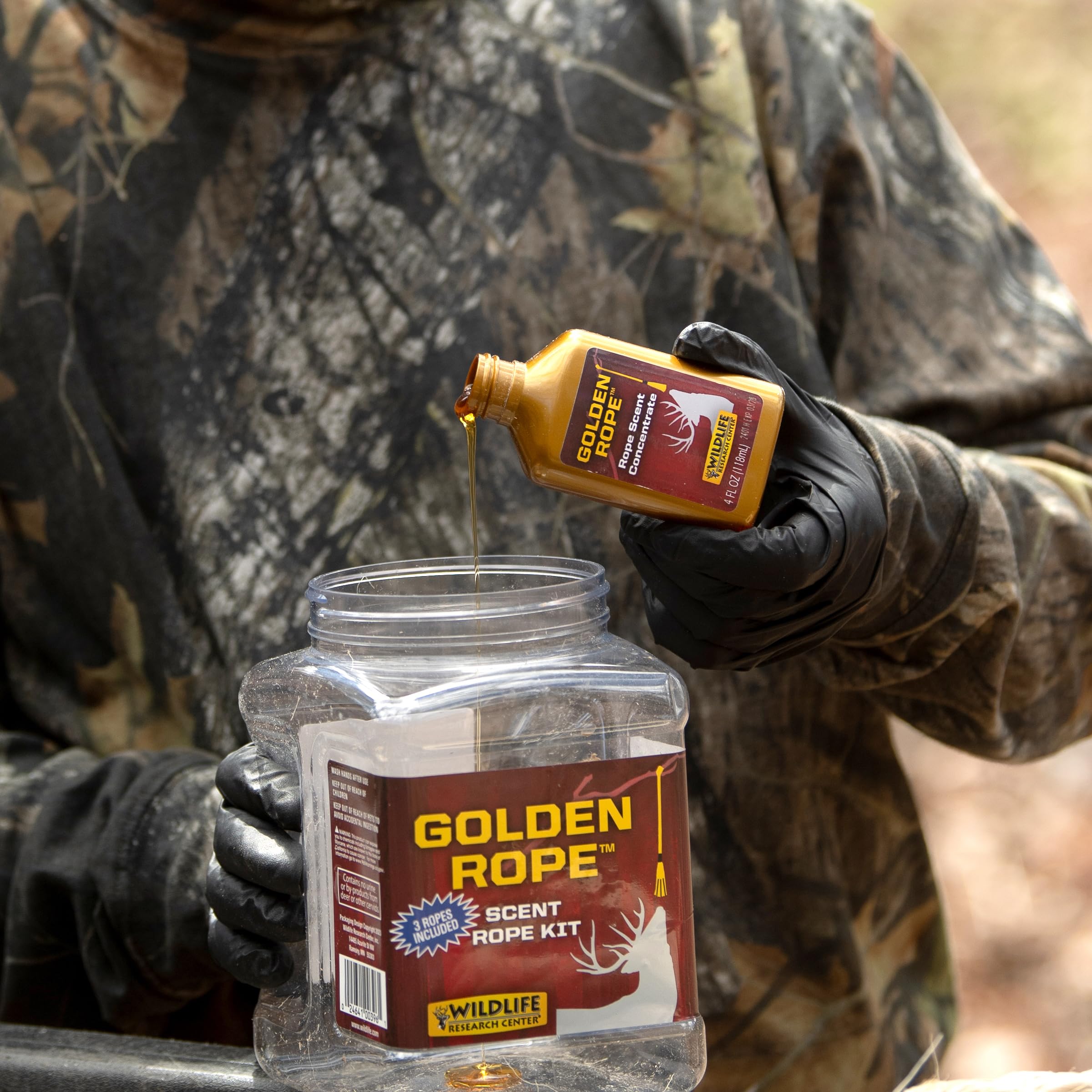 Wildlife Research Center Golden Rope Scent concentrate being poured for quick deployment