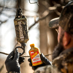 Wildlife Research Center Golden Scrape Scent doe urine detail highlighting estrus component