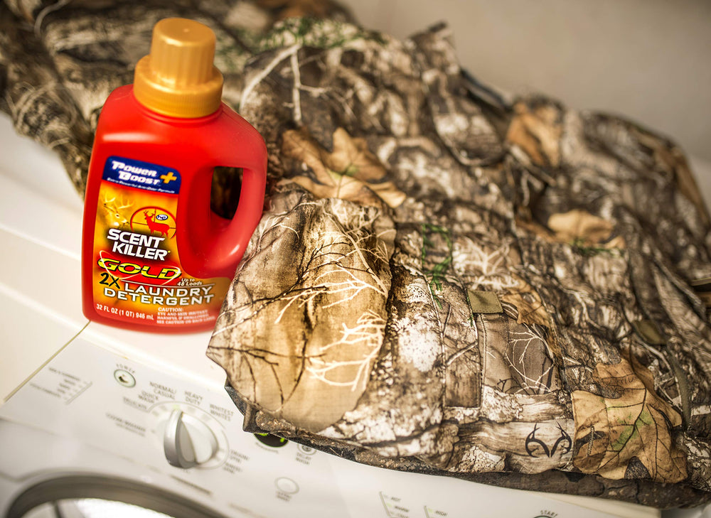 Hunting clothes being washed to extend gear lifespan with a gentle, scent-free clean.