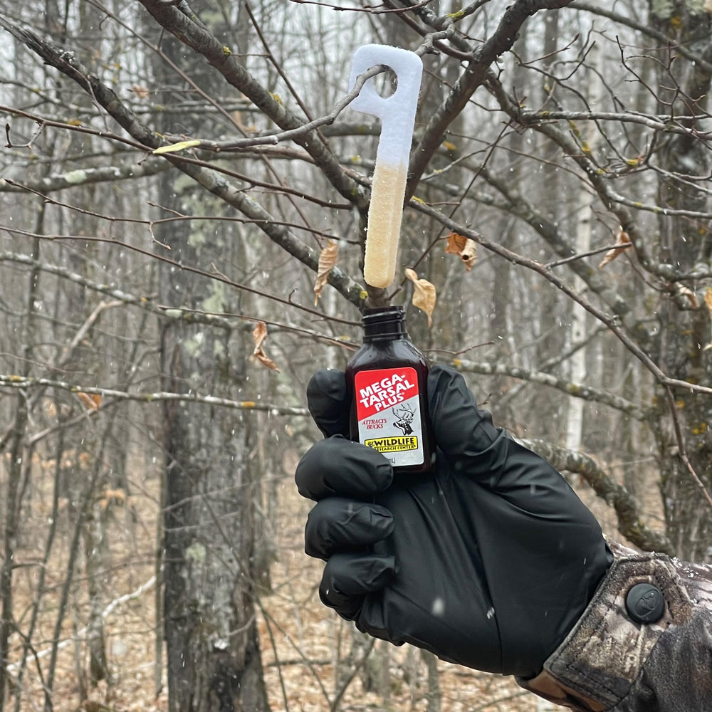 Amber glass Mega-Tarsal Plus bottle used in field