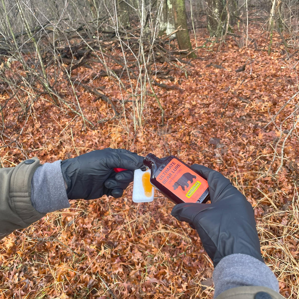 Wildlife Research Center Pro-Wick in field use during setup for scent distribution