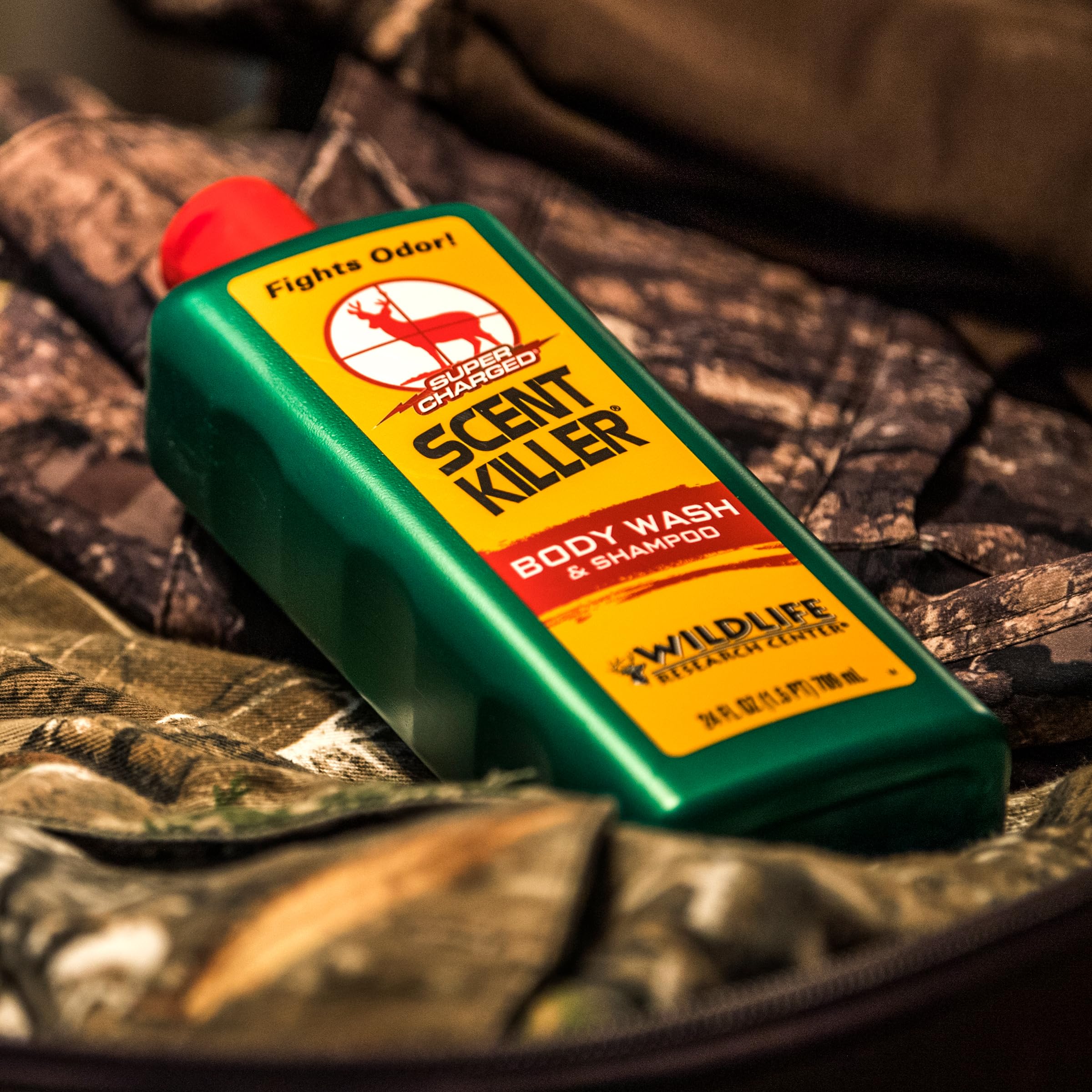 Wildlife Research Center Scent Killer 540-24 bottle pour demonstrates 2-in-1 wash and shampoo use.