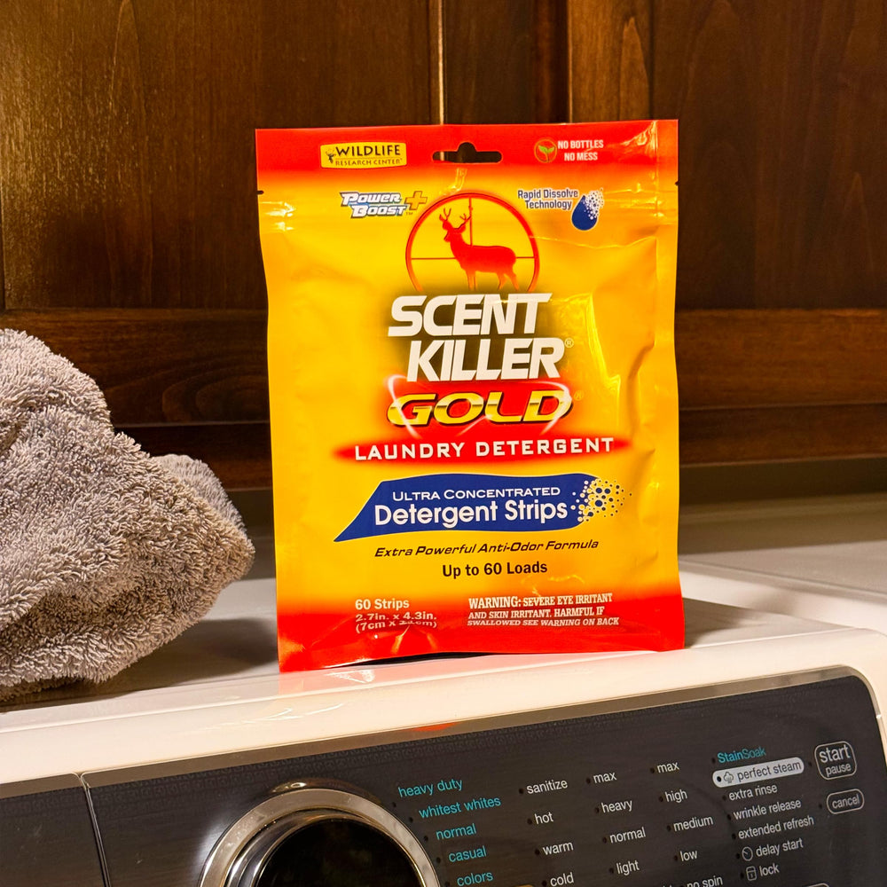 Close-up of Scent Killer Gold strips highlighting ultra-concentration for odor elimination.