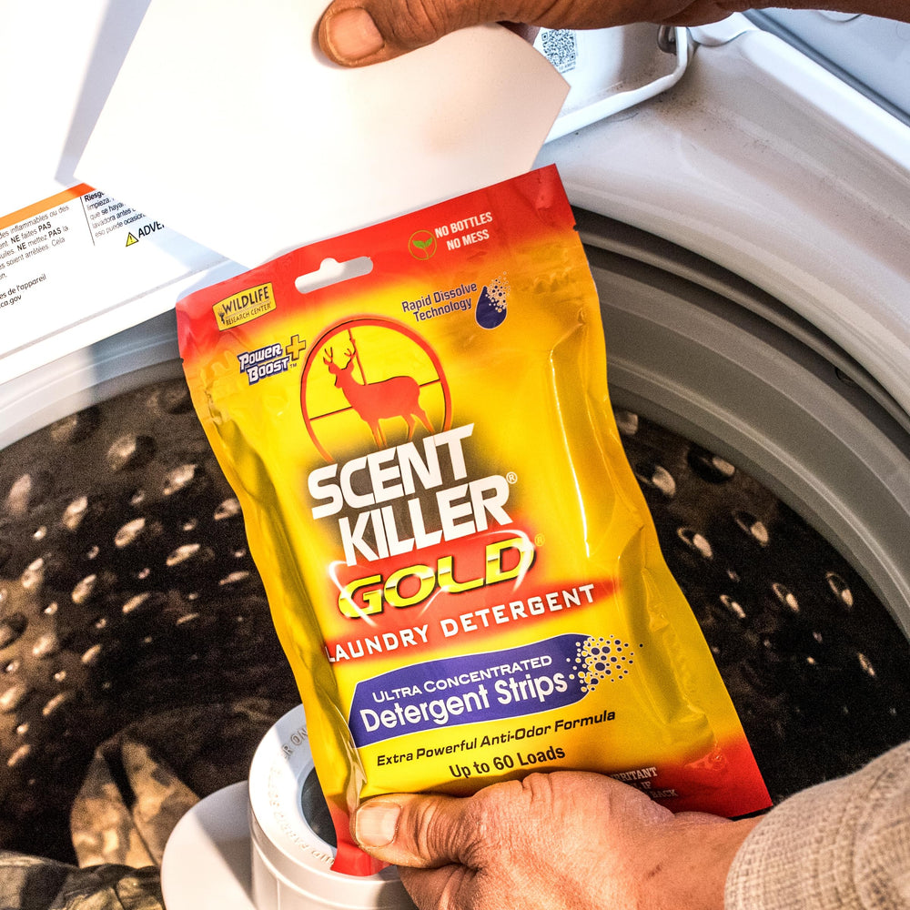 Strips being added to washing to remove human scents from gear.