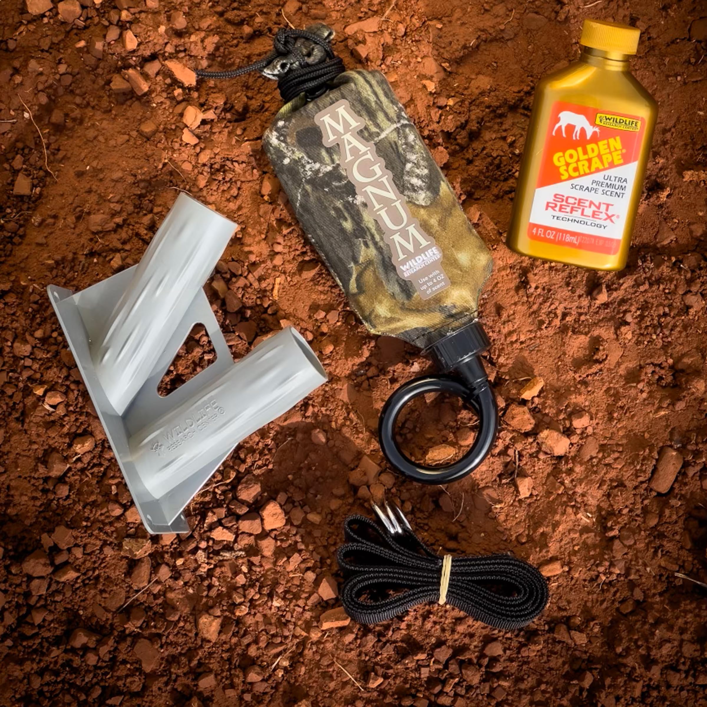 Wildlife Research Center Scrape scent bottle near dripper for daytime cues.