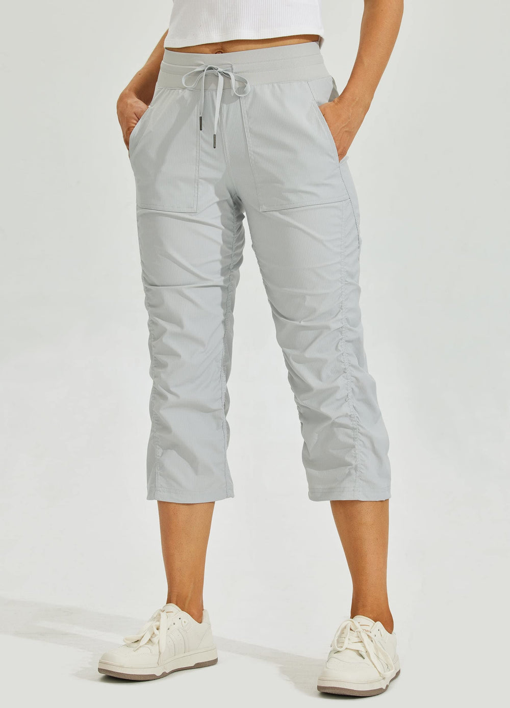 Willit capris adjustable-hem close-up shows secure leg lines during activity