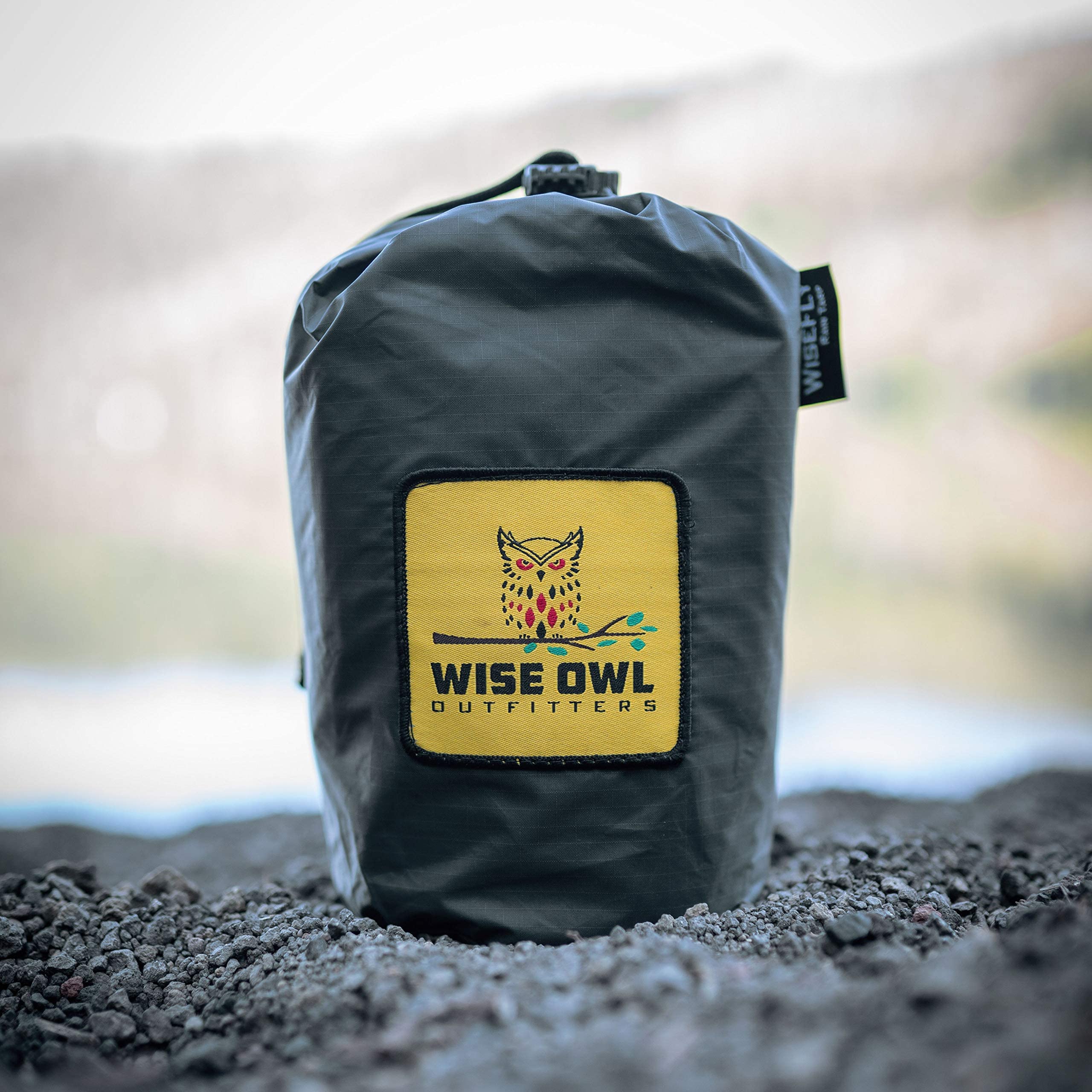 Wise Owl multi-function tarp serving as rain fly, hammock canopy, or sun shade.