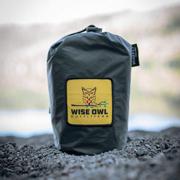 Wise Owl multi-function tarp serving as rain fly, hammock canopy, or sun shade.