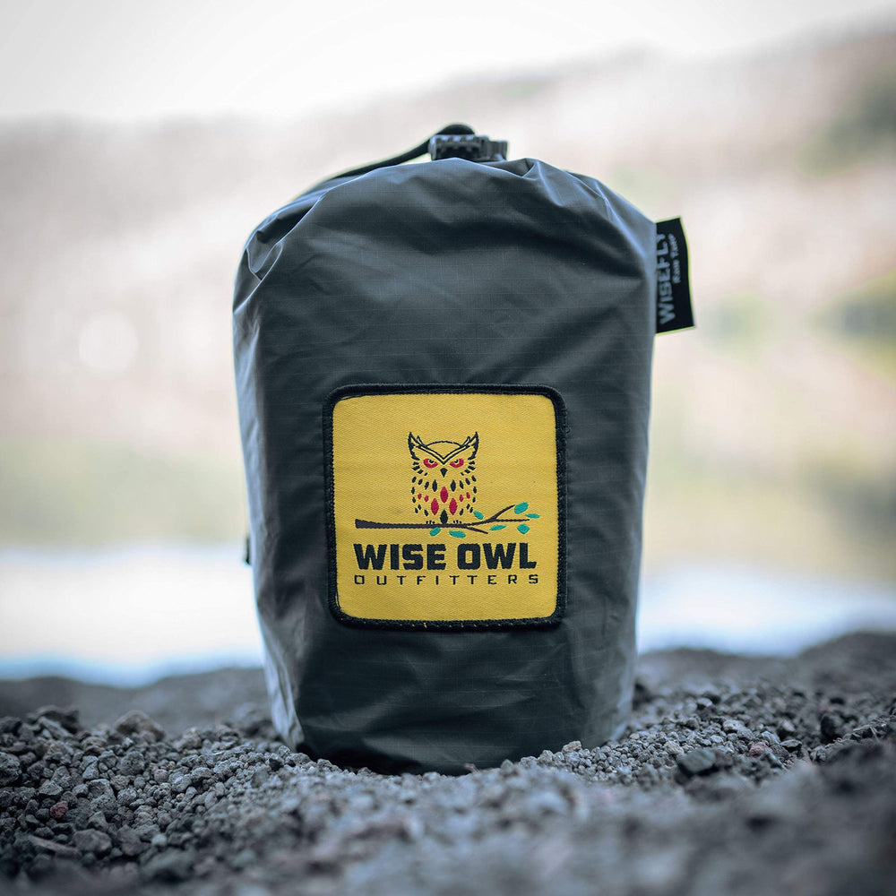 Wise Owl multi-function tarp serving as rain fly, hammock canopy, or sun shade.