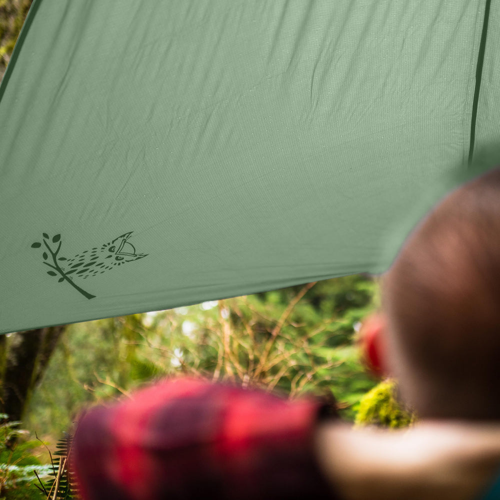 Wise Owl Outfitters 11x9 ft coverage provides ample space for hammock setups.