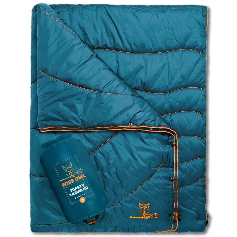 Wise Owl Outfitters blanket rolled for compact backpacking.