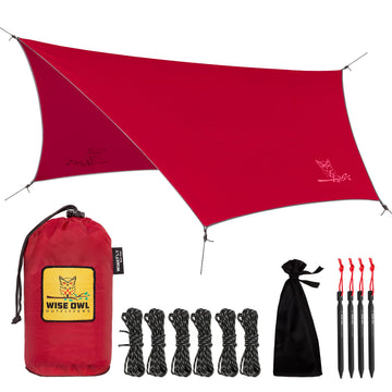 Wise Owl Outfitters hammock rain fly folded, compact ultralight shelter option.