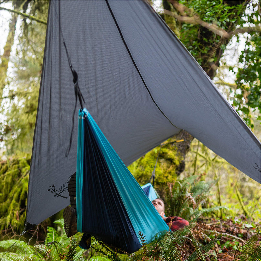 Wise Owl Outfitters multi-function shelter serves as rain fly or hammock shade on trail