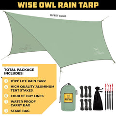 Wise Owl Outfitters tarp-stakes aluminum secure shelter on rugged ground.