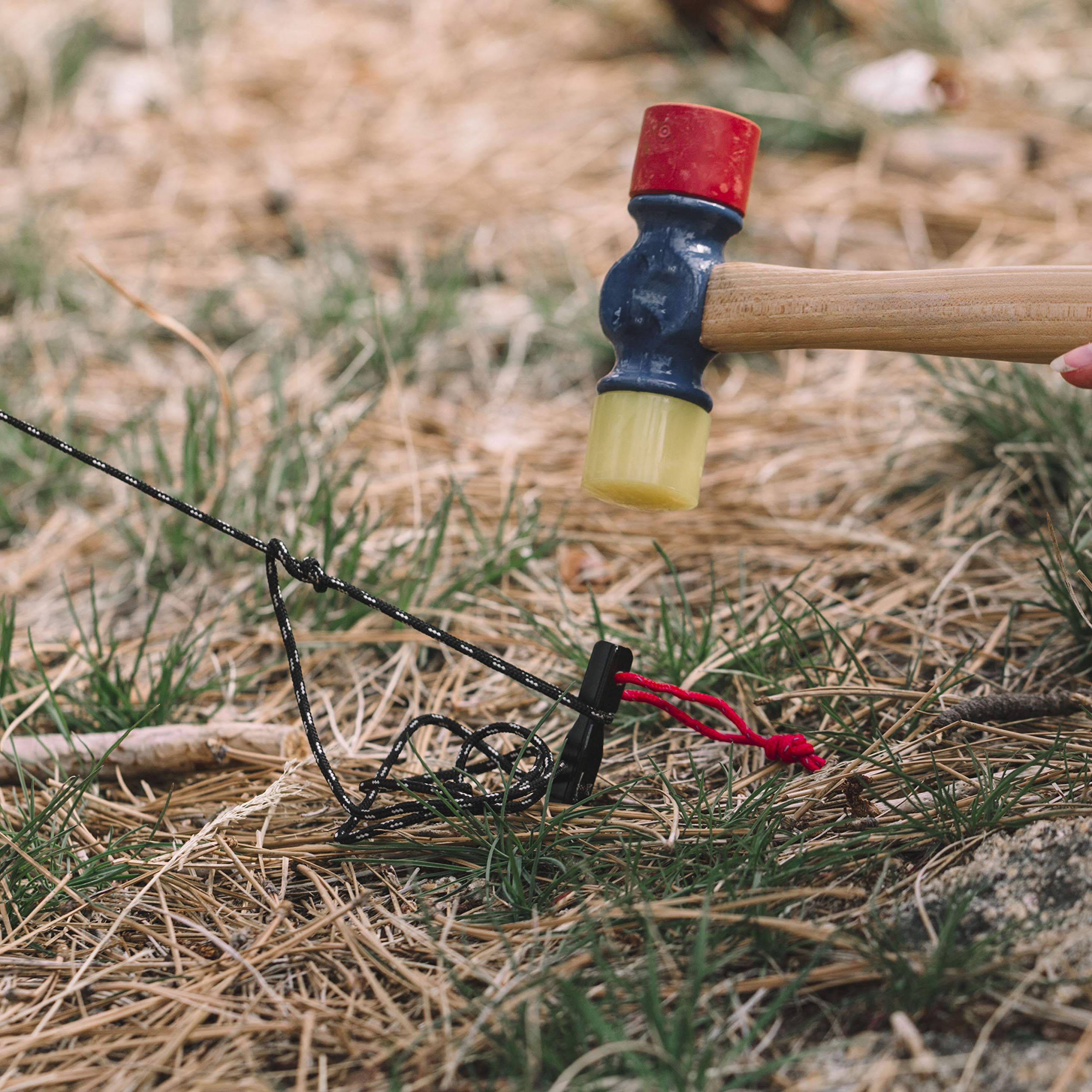 Wise Owl Outfitters bright red paracord tops aid quick stake removal.