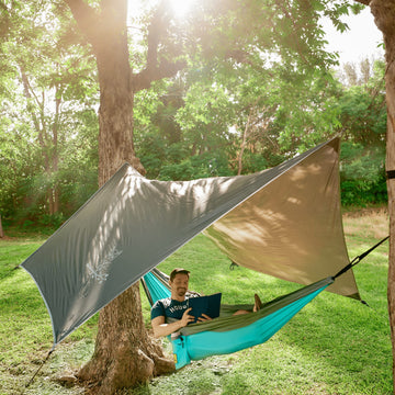 Wise Owl ultralight tarp at 26oz packs compactly for backpacking.