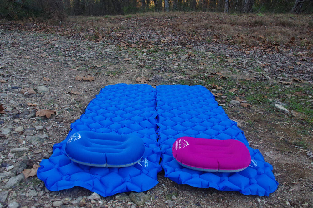 Wisemen Outdoors ultralight pillow with U-shape supports head and back.