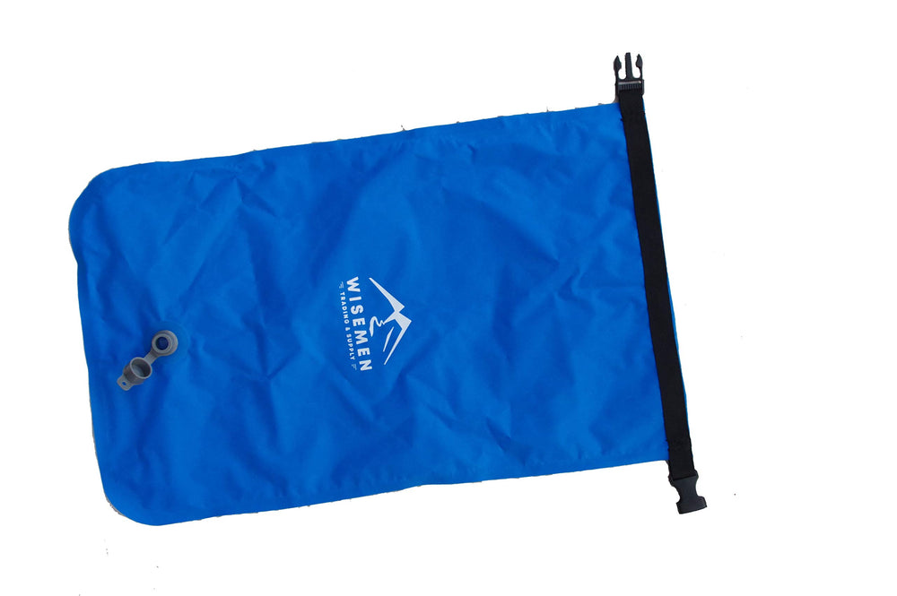 Wisemen Trading inflation bag showing water resistance for gear storage.