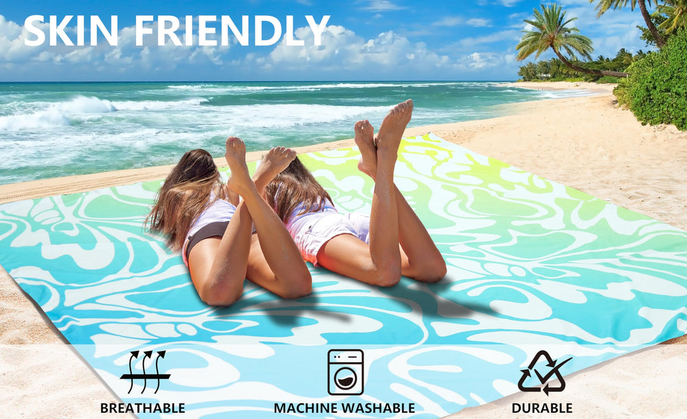 WIWIGO Beach Blanket anchor stakes secure corners for steady ground placement.