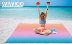 WIWIGO beach blanket folded compactly fits in small carry bag.