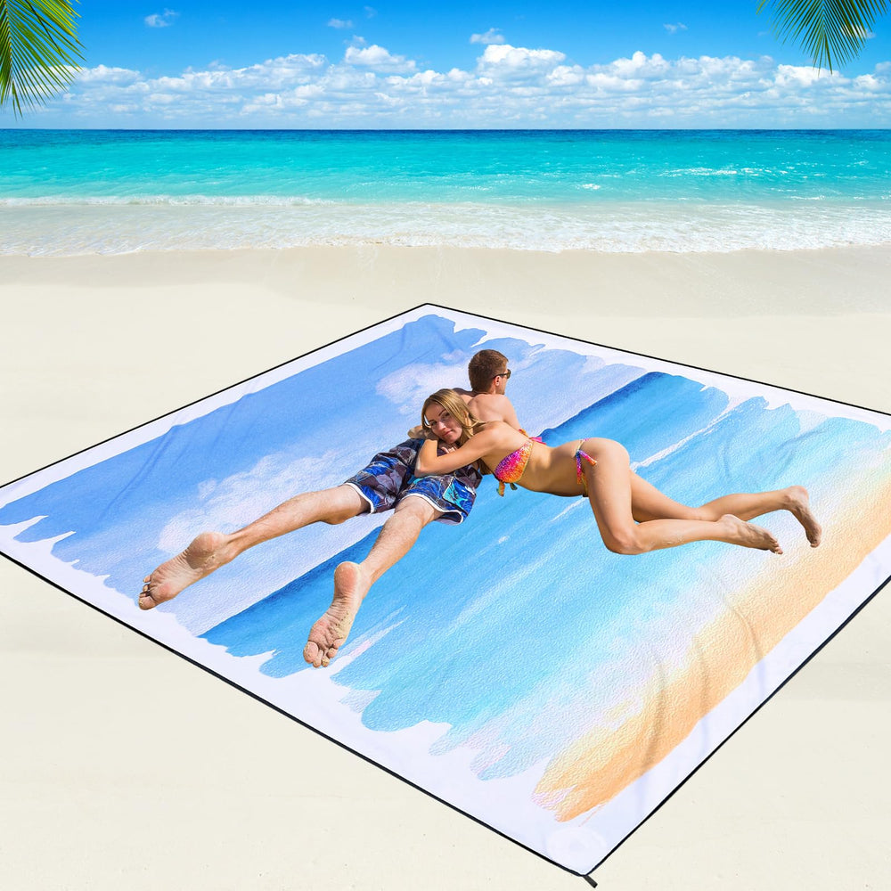 WIWIGO Beach Blanket folded in a tote bag showing portable travel setup.