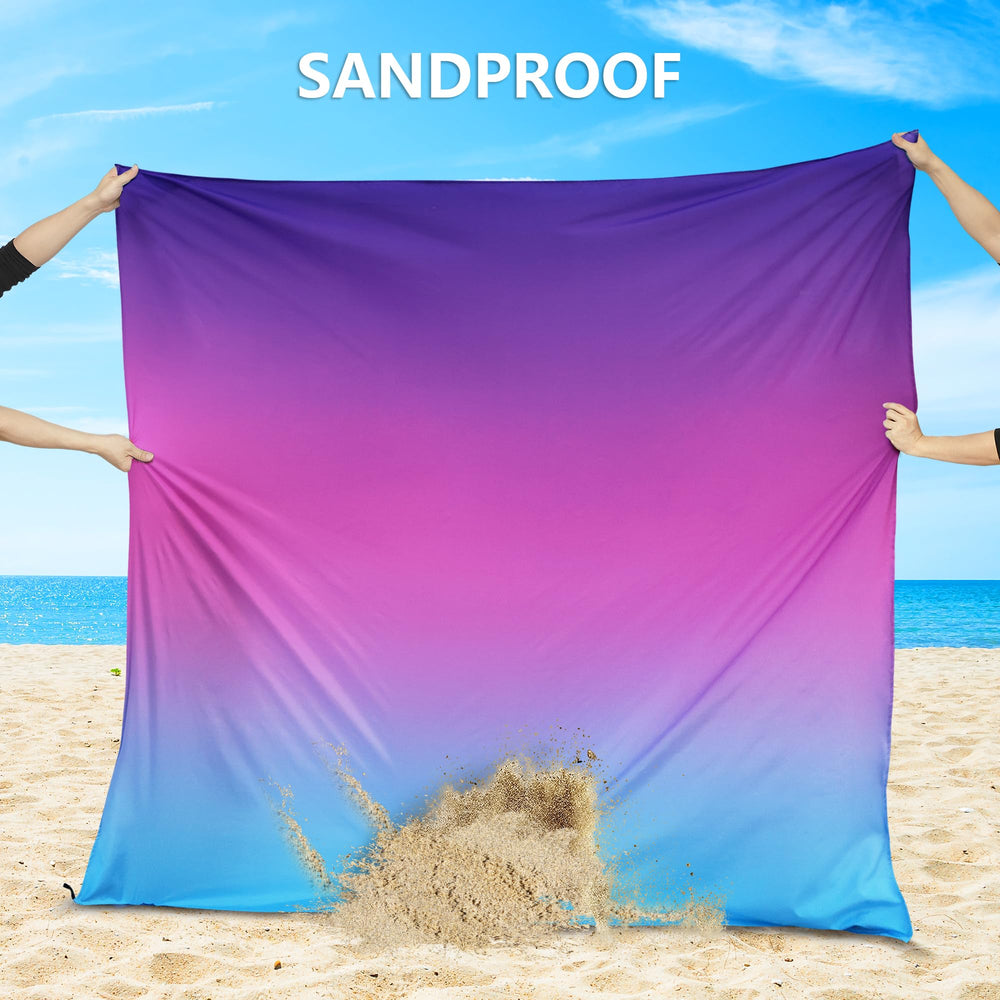WIWIGO Beach Blanket laid out for picnic or camping, offering dry comfort on grass.