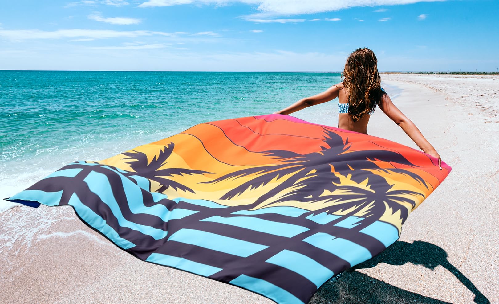 WIWIGO multi-use outdoor blanket used for picnic camping and beach outings.