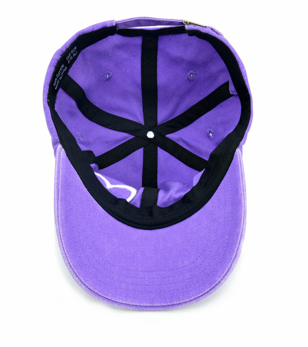 Product packaging and hat on white background