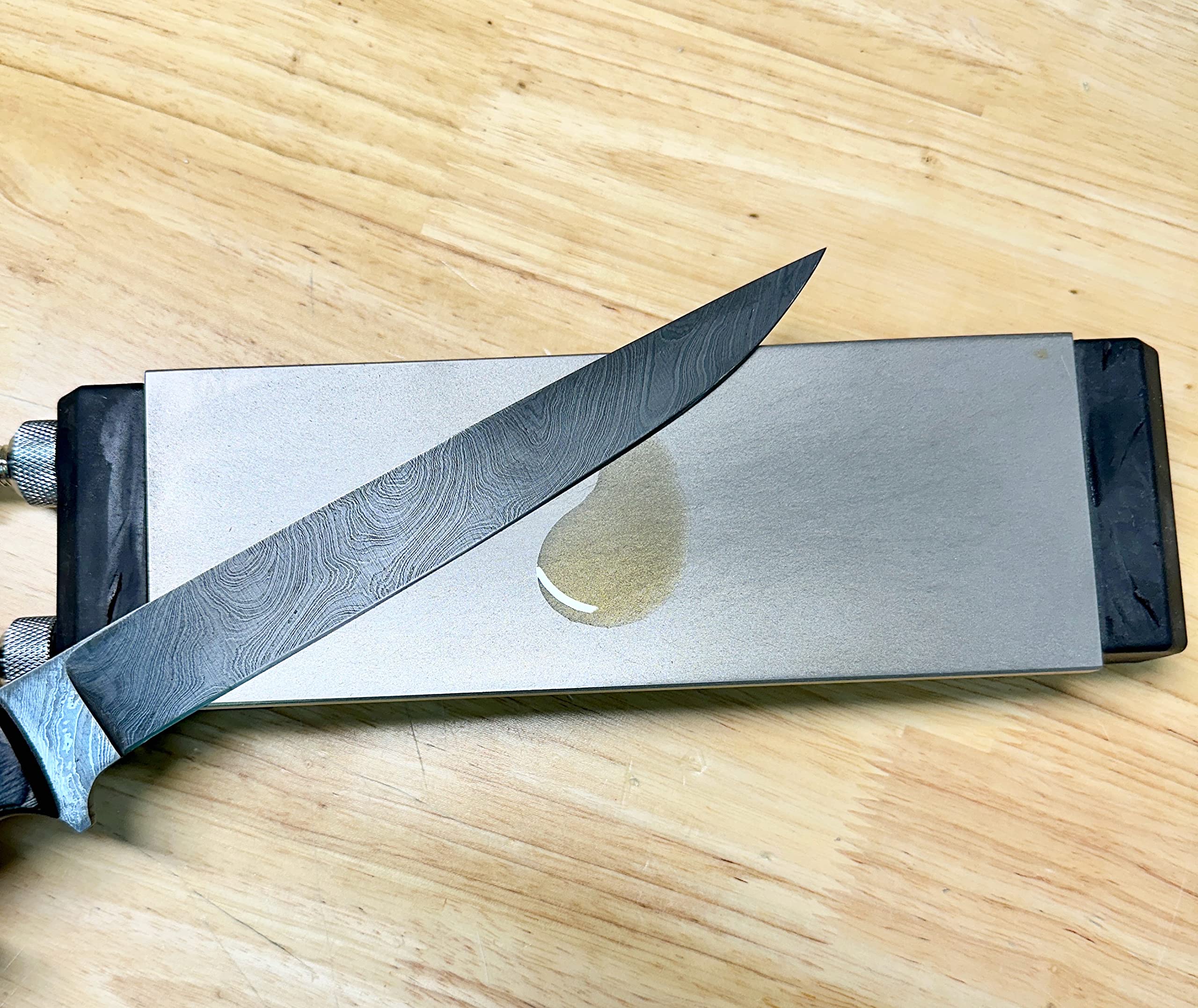 Wolf Premium Oils Honing Master cleans and conditions wet stones and metal or diamond sharpeners.